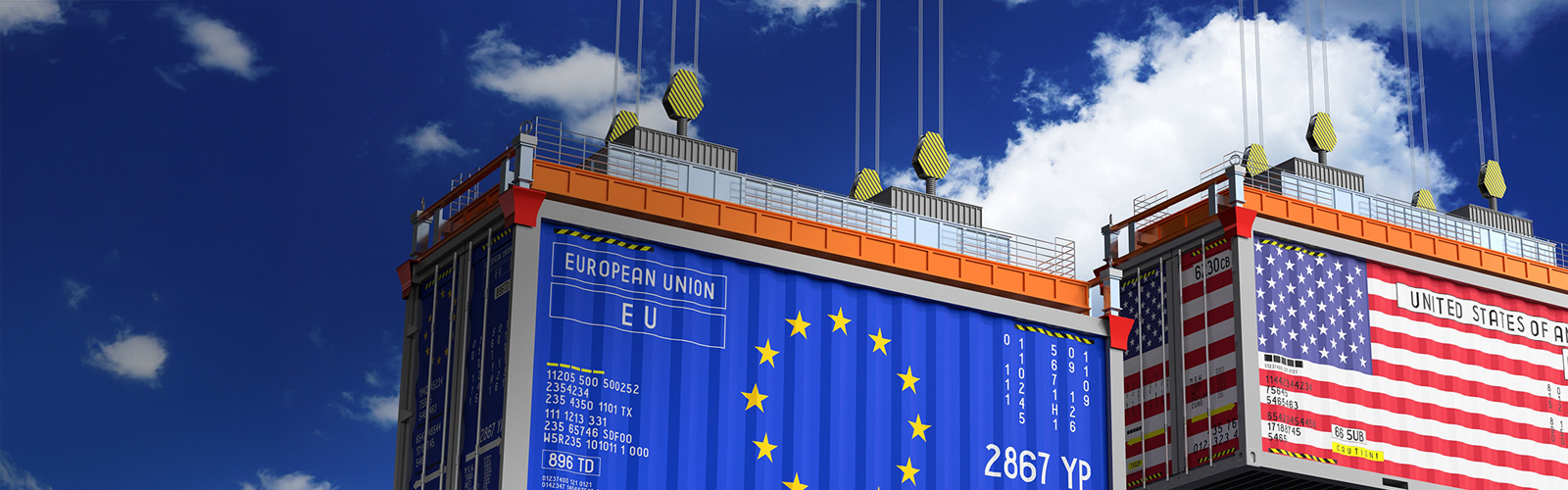 dos contenedores con las banderas de la UE y EE. UU. para el nuevo régimen de aranceles