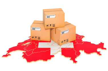 Imagen de tres cajas de paquetería sobre el mapa de Suiza