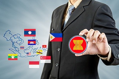 ASEAN Economic Community in businessman hand