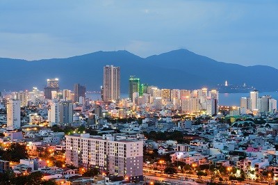 Da Nang city skyline cityscape with buildings by beach at twilight in Da Nang, central Vietnam